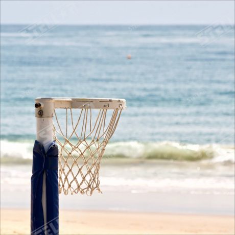 Thumbnail Netball Hoop Close Up Ocean Background positioned left