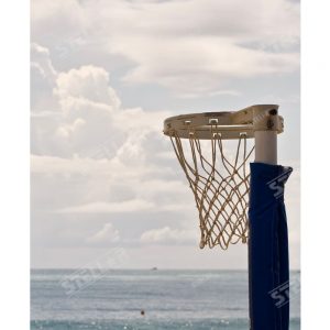 Thumbnail Netball Hoop Close Up Positioned Right. Sunset Sky and Ocean Background