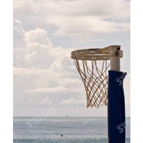 Thumbnail Netball Hoop Close Up Positioned Right. Sunset Sky and Ocean Background